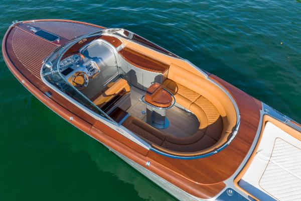 Slide: The Image of 2020 Riva Aquariva Super luxury speedboat with elegant wooden deck and leather seating. - 11