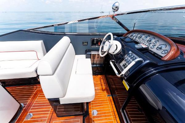 Slide: The Image of Interior of 2020 Riva Aquariva Super yacht with white seating and wooden flooring. - 17