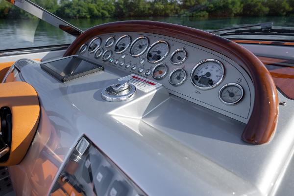 Slide: The Image of Dashboard of a 2020 Riva Aquariva Super boat with gauges and controls. - 19