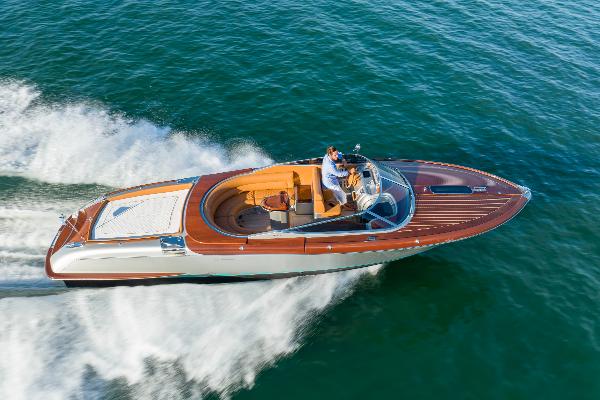 Slide: The Image of 2020 Riva Aquariva Super luxury speedboat cruising on open water. - 25