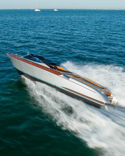Slide: The Image of Riva Aquariva Super 2020 luxury speedboat cruising on open water. - 27