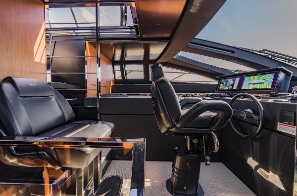 Slide: The Image of Luxurious interior of 2019 Riva ARGO yacht with modern helm and seating. - 17