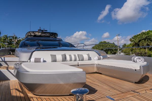 Slide: The Image of Luxurious 2019 Riva ARGO yacht with sleek design and spacious deck under blue sky. - 24