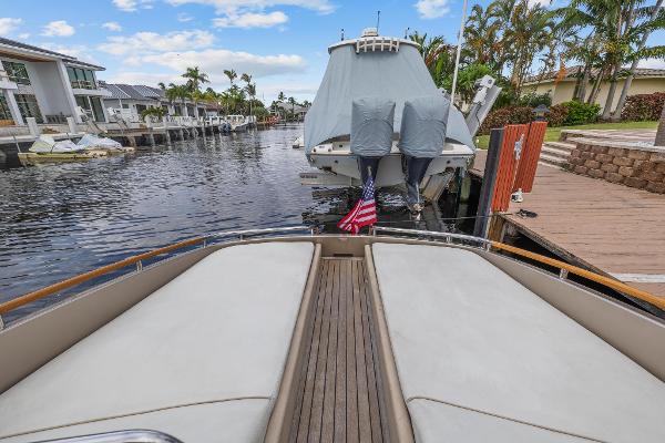 Slide: The Image of View from the bow of a 2010 Riva Rama boat docked in a canal. - 17