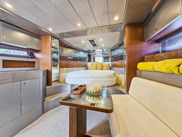 Slide: The Image of Luxurious interior of 2010 Riva Rama yacht with modern furnishings and cozy seating. - 18
