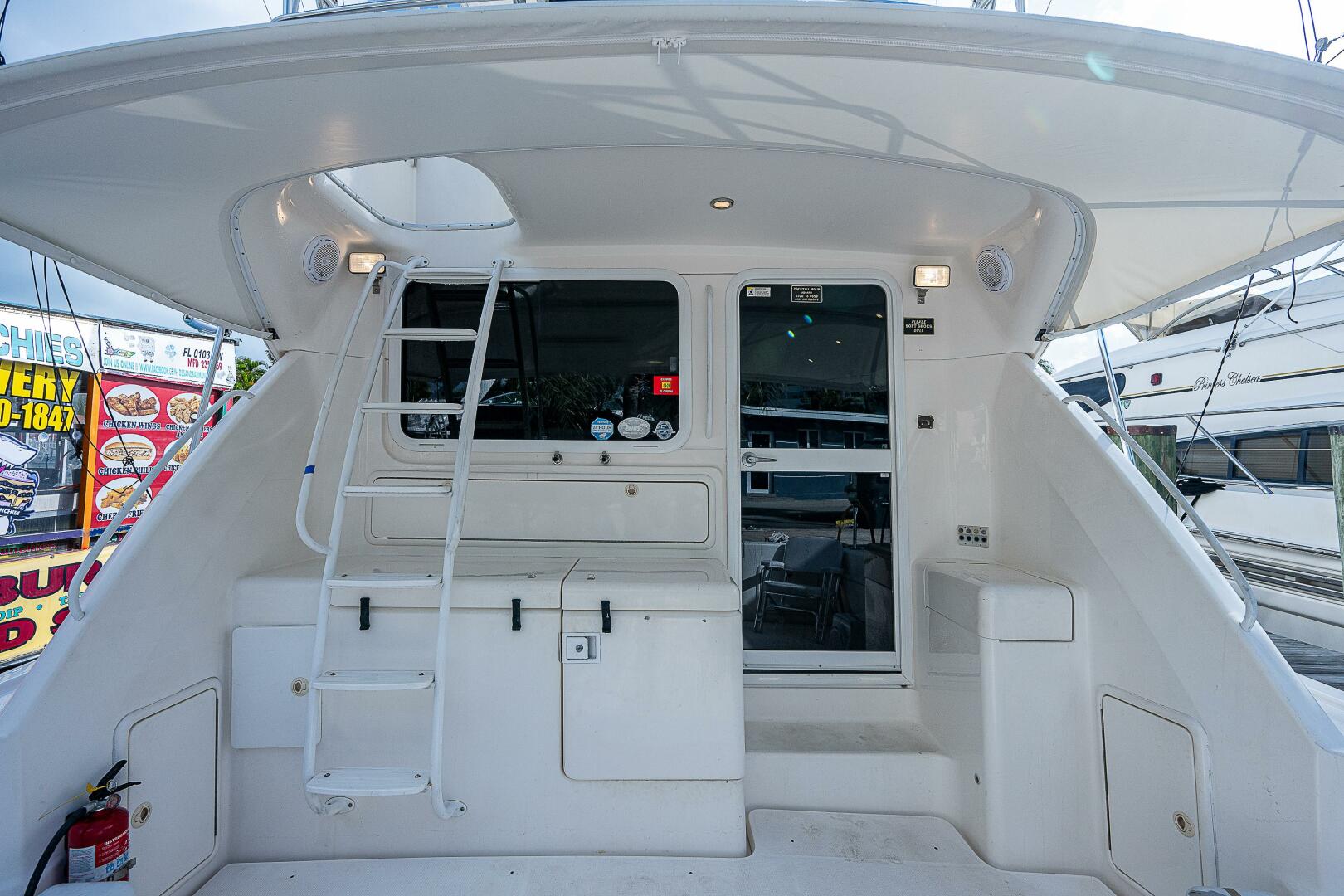 Slide: The Image of Cockpit 2004 Riviera 42 Flybridge Black Pearl - 4009919