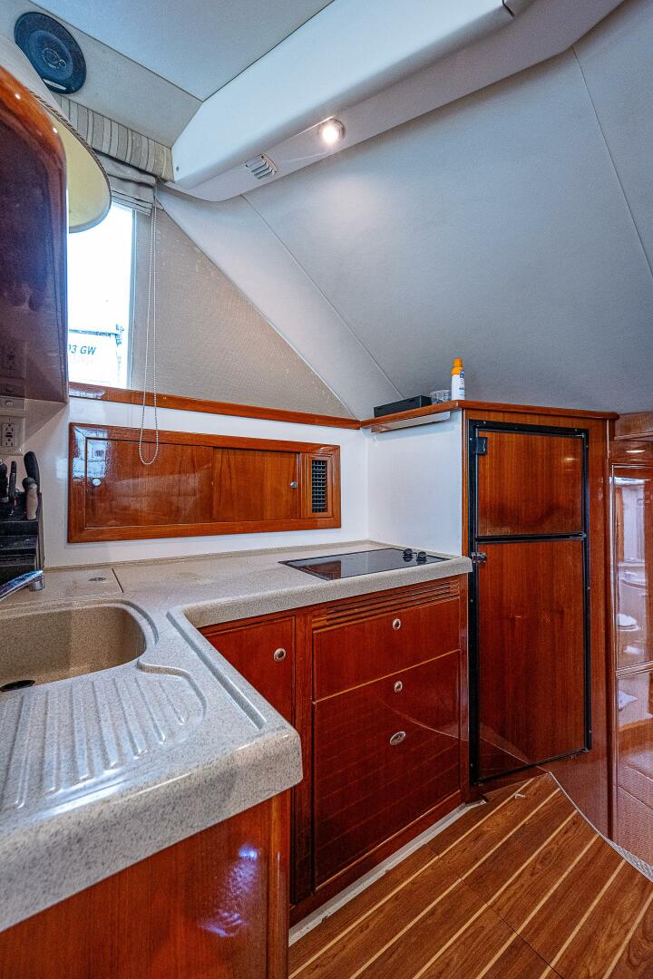 Slide: The Image of Galley 2004 Riviera 42 Flybridge Black Pearl - 4009903