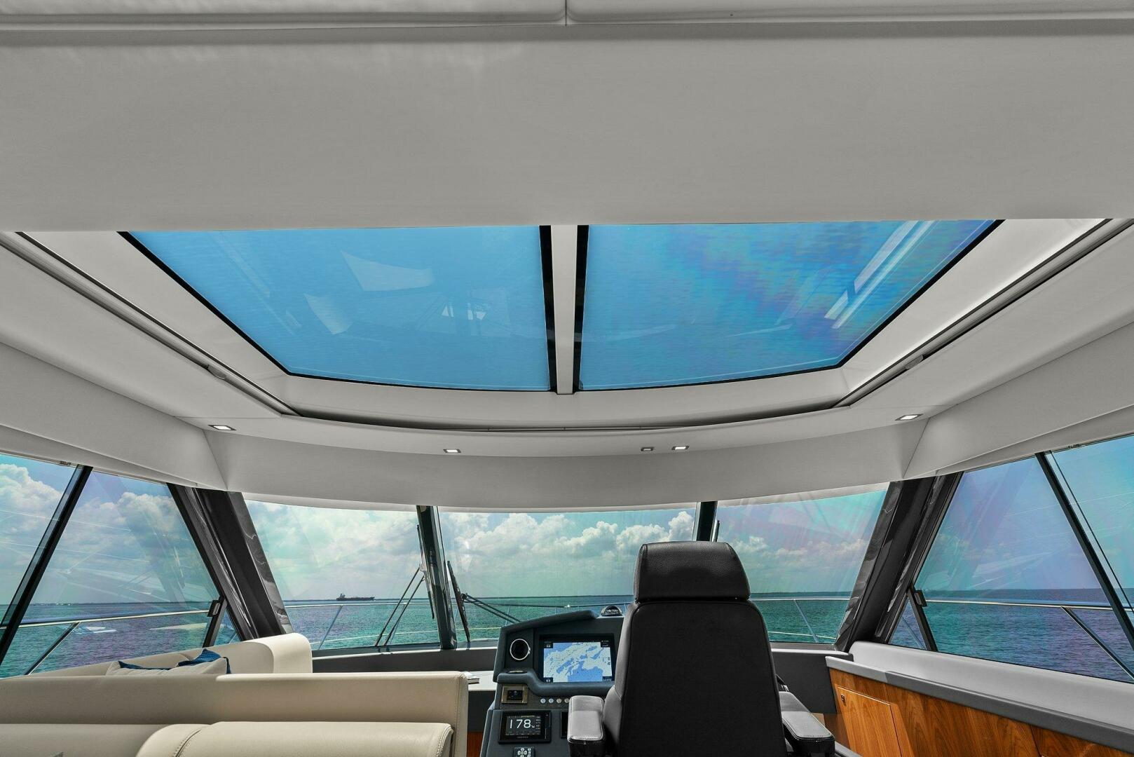Slide: The Image of 2021 Riviera 5400 Sport Yacht- Helm - 5322735