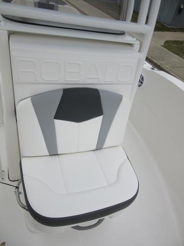 Slide: The Image of 2024 Robalo R180 Center Console boat seat with white and gray upholstery. - 10