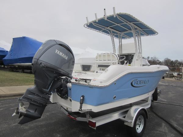 Slide: The Image of 2024 Robalo R180 Center Console boat with Yamaha outboard motor on trailer. - 6