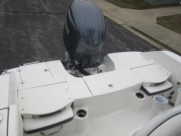Slide: The Image of 2024 Robalo R180 Center Console boat with Yamaha outboard motor. - 8