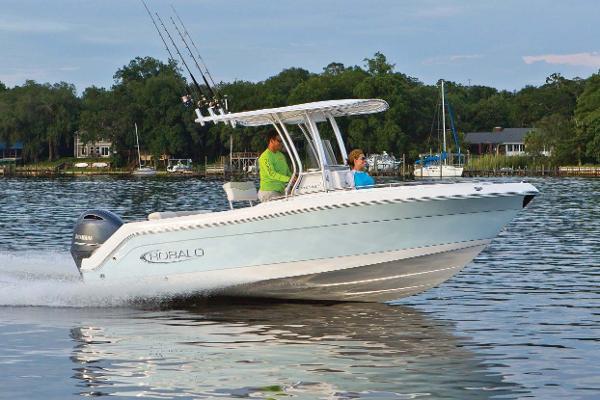 Slide: The Image of Manufacturer Provided Image: 2022 Robalo R222 Center Console boat cruising on a lake. - 21