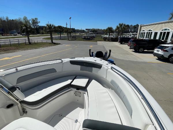 Slide: The Image of 2024 Robalo R222 Explorer boat with spacious seating and modern design. - 15