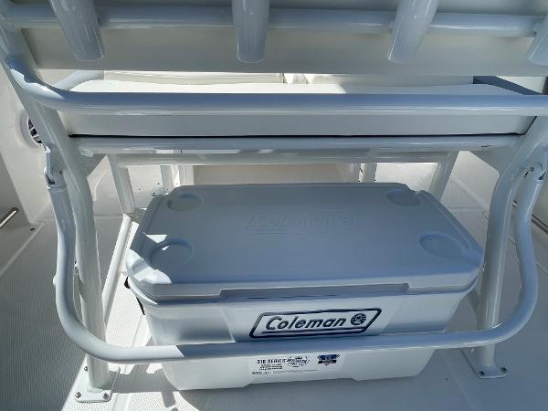Slide: The Image of 2024 Robalo R222 Explorer boat with Coleman cooler storage. - 7