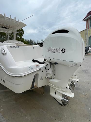 Slide: The Image of 2019 Robalo R242 Center Console boat with Yamaha outboard motor. - 8