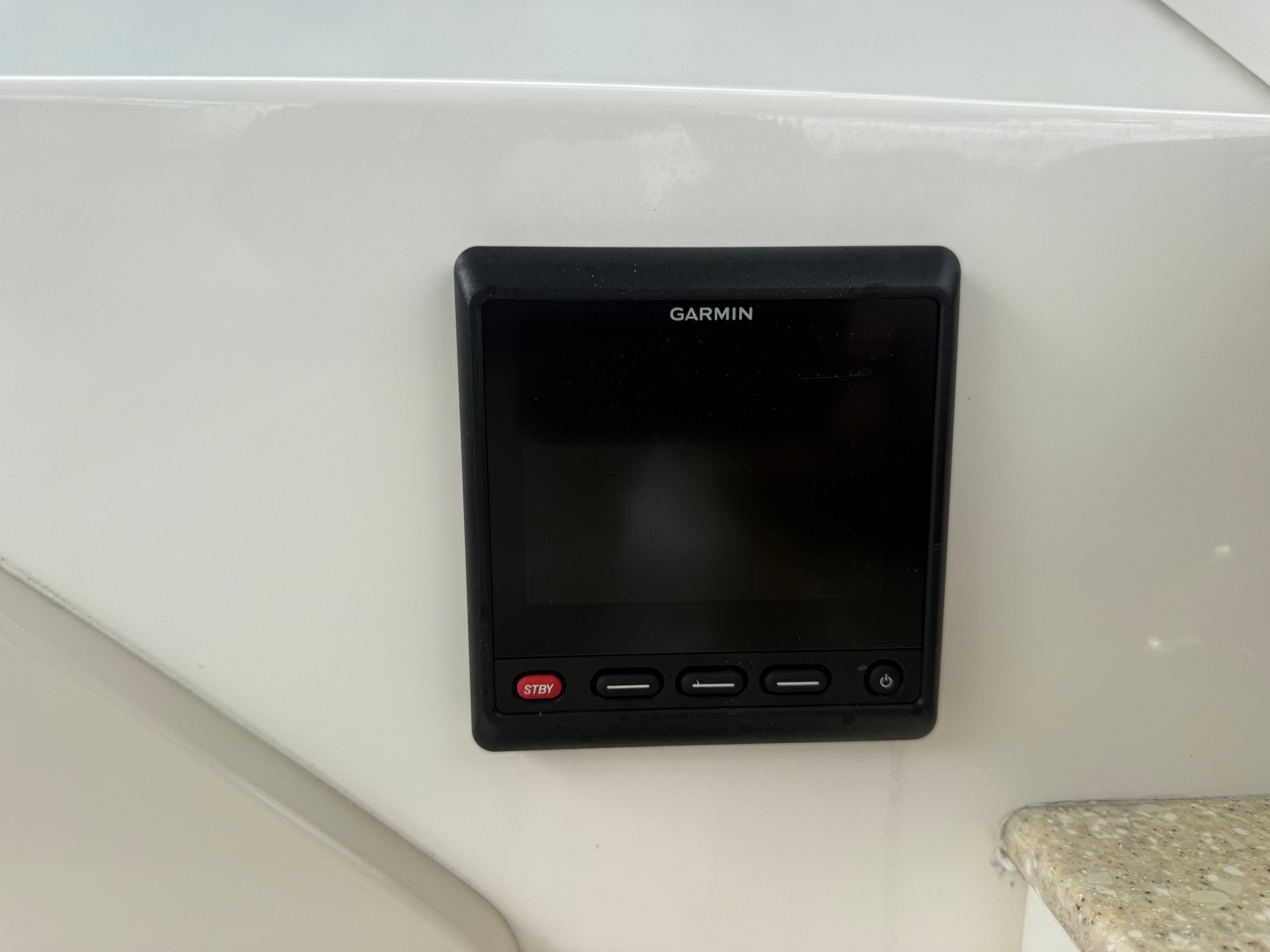 Slide: The Image of Garmin display on 2018 Robalo R247 Dual Console boat dashboard. - 26