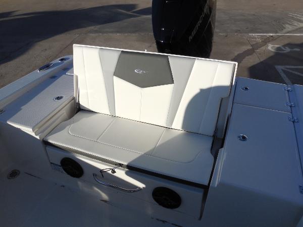 Slide: The Image of 2024 Robalo R266 Cayman boat seat with storage and speakers. - 8