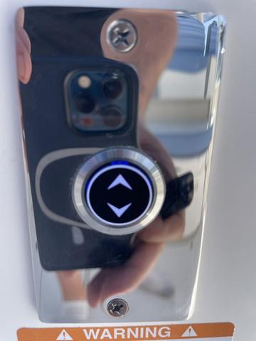 Slide: The Image of Close-up of control button on 2024 Robalo R360 boat. - 11