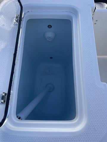 Slide: The Image of 2024 Robalo R360 livewell compartment. - 15