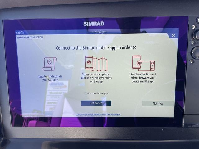Slide: The Image of Simrad display on 2024 Robalo R360 boat showing mobile app connection options. - 28