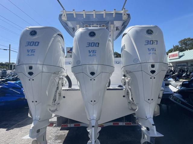 Slide: The Image of 2024 Robalo R360 boat with triple Yamaha 300 V6 outboard engines. - 3