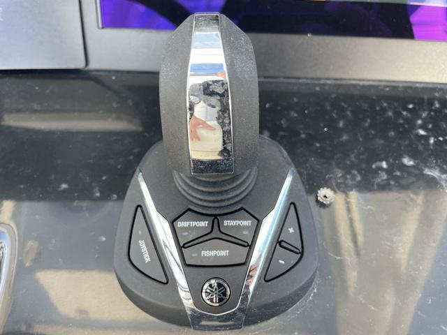 Slide: The Image of Joystick control panel of 2024 Robalo R360 boat with Driftpoint, Staypoint, and Fishpoint buttons. - 30