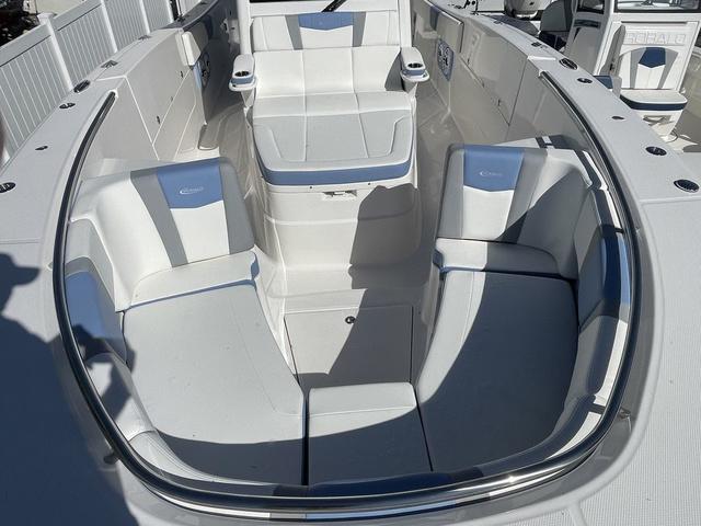 Slide: The Image of 2024 Robalo R360 boat interior with white and gray seating. - 38