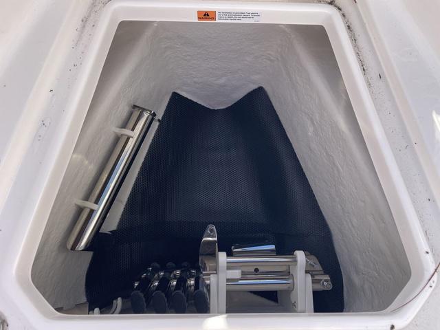 Slide: The Image of 2024 Robalo R360 anchor storage compartment. - 45