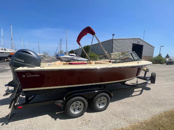 Slide: The Image of 2021 Rossiter 20 Coastal Cruiser boat on trailer with Yamaha outboard motor. - 1
