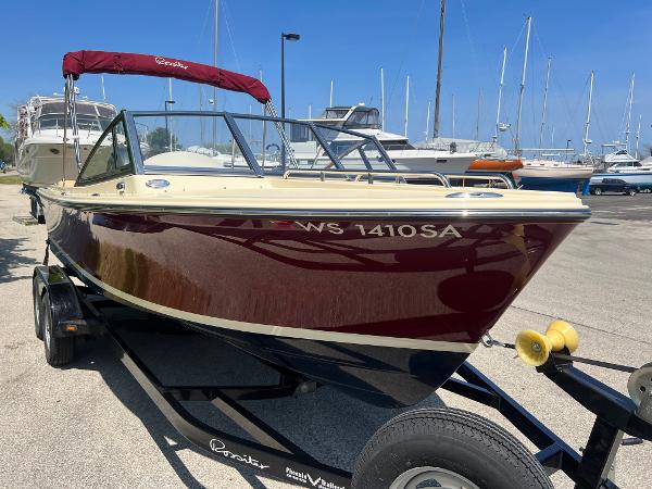 Slide: The Image of 2021 Rossiter 20 Coastal Cruiser boat on trailer at marina. - 5