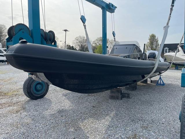 Slide: The Image of 2022 Roughneck RIB 1010 boat in dry dock, ready for maintenance. - 8