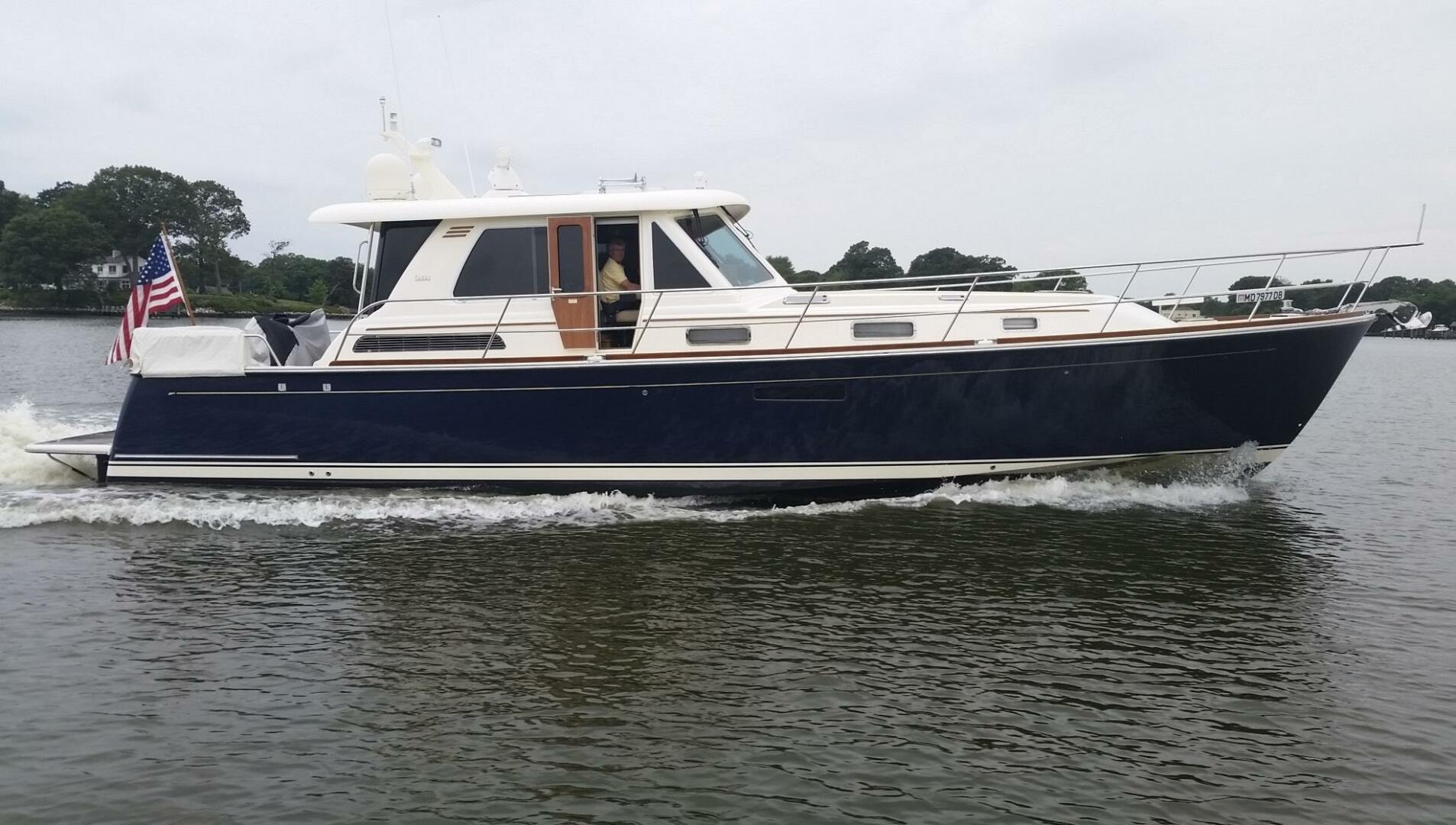 Slide: The Image of Sabre 48 Salon Express New Flag Blue Awlgrip hull paint in 2024! - 0