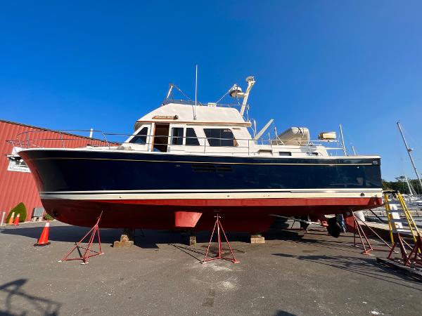 Slide: The Image of 2001 Sabre Sabreline 47 yacht on dry dock for maintenance. - 0