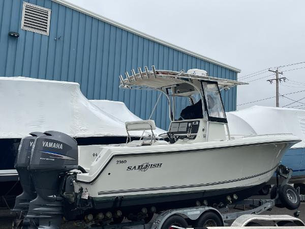 Slide: The Image of 2006 Sailfish 2360 CC boat with Yamaha outboard motor on trailer. - 1