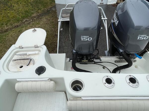 Slide: The Image of 2006 Sailfish 2360 CC boat with twin Yamaha 150 engines, rear deck view. - 15