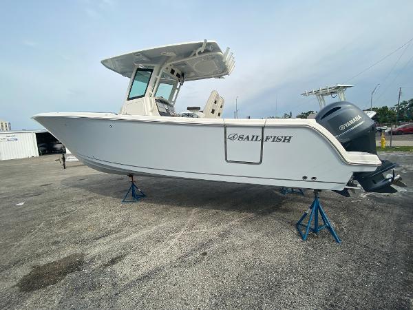 Slide: The Image of 2023 Sailfish 272 CC boat on stands, side view. - 10