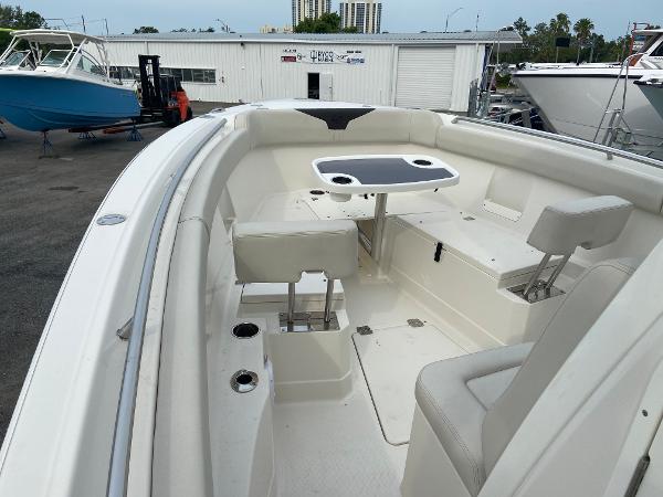 Slide: The Image of 2023 Sailfish 272 CC boat interior with seating and table. - 28