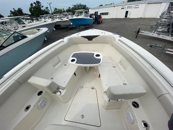Slide: The Image of 2023 Sailfish 272 CC boat interior with seating and table. - 29