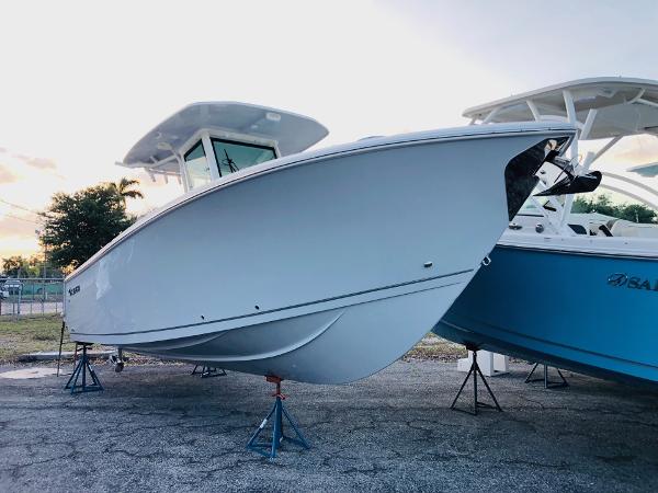 Slide: The Image of 2023 Sailfish 272 CC boat on stands, side view. - 6