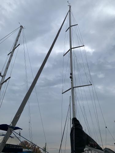 Slide: The Image of 2013 Salona 38 sailboat mast against a cloudy sky. - 15