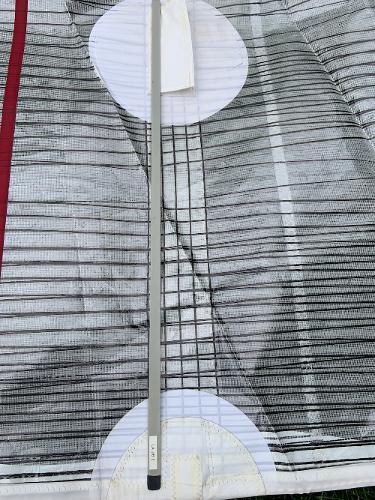 Slide: The Image of Close-up of a 2013 Salona 38 sail with battens and stitching details. - 17