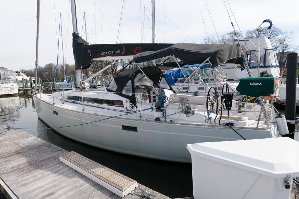 Slide: The Image of 2013 Salona 38 sailboat docked at a marina. - 2