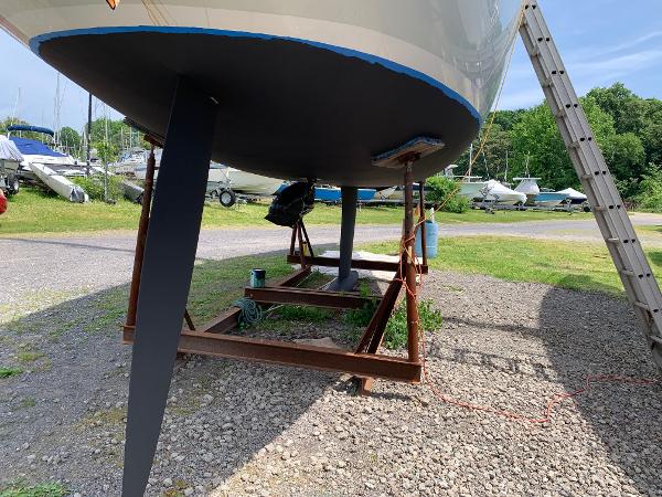Slide: The Image of Salona 38 sailboat from 2013 on a stand for maintenance in a boatyard. - 5