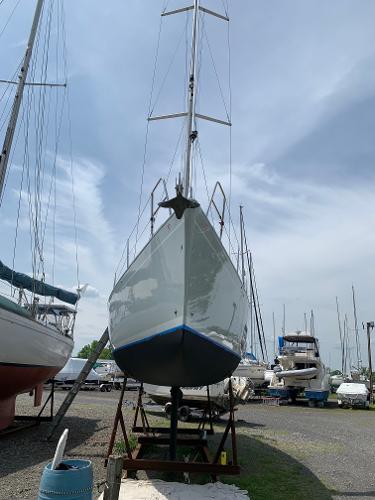 Slide: The Image of 2013 Salona 38 sailboat on dry dock in a marina. - 6