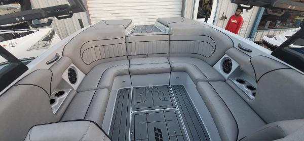 Slide: The Image of Interior of 2023 Sanger 231 SL boat with spacious seating and modern design. - 34