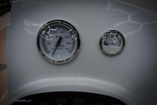 Slide: The Image of Close-up of Savannah SS19 2023 boat dashboard with RPM and fuel gauges. - 11