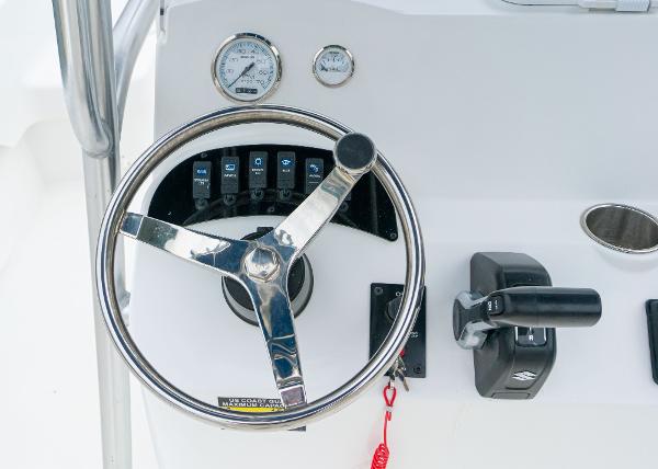 Slide: The Image of Steering console of 2023 Savannah SS21 boat with gauges and controls. - 6