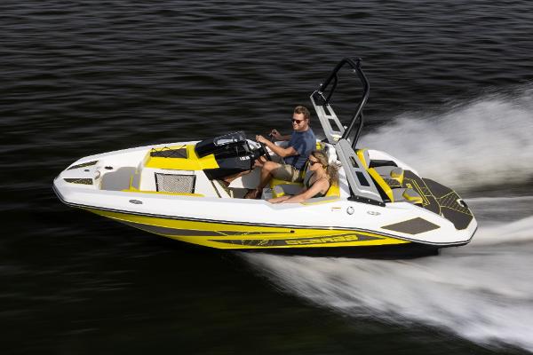 Slide: The Image of 2023 Scarab 165ID speedboat cruising on water. - 15