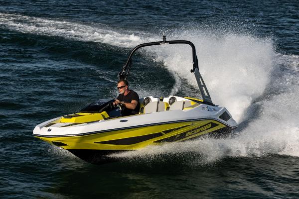 Slide: The Image of 2023 Scarab 165ID speedboat cruising on water, creating a splash. - 17