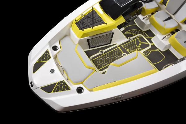 Slide: The Image of 2023 Scarab 165ID boat interior with yellow and gray accents. - 26